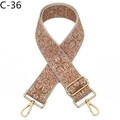 Close-up of ethnic floral embroidery patterns on wide adjustable bag strap with gold hooks - Antique Brass Buckle / Brown (C-36)