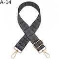Close-up of adjustable black and white woven bag strap with golden metal swivel hooks - Black Sparkle Diamond (A-14)
