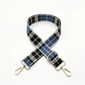 Close-up of adjustable blue and black checkered canvas strap with gold metal hooks - Silver Clasp / No.1 Blue Black Plaid