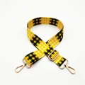 Detail view of yellow and black checkered bag strap with gold metal lobster clasp and buckle - No.3 Yellow Black Plaid