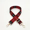 Detail view of adjustable red and black plaid bag strap with gold metal hooks - Silver Clasp / No.12 Red Plaid
