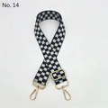 Detail of adjustable black and white checkered shoulder strap with gold metal hooks - No.14 Black White Checkerboard