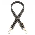 Detalle de correa de bolso de jacquard ajustable en blanco y negro con mosquetones dorados - N.º 9 Negro y Beige / Cierre de Plata