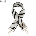 Close-up of zebra pattern woven bag strap with golden rotating lobster buckles - Cream Black Striped