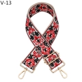 Dettaglio della tracolla jacquard etnica con motivi rossi e neri e clip in metallo dorato - V-13 Ipomea Rossa