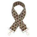 Close-up of adjustable wide woven shoulder strap with polka dots and gold hardware - Silver Clasp / Matcha Green