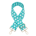 Close-up of teal polka dot woven bag strap with golden metal hardware and adjuster - Silver Clasp / Light Green