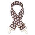 Close-up of adjustable brown polka dot bag strap with premium gold metal hardware - Silver Clasp / Khaki