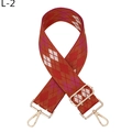 Detail of adjustable argyle woven bag strap with golden metal lobster clasps - Red