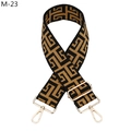 Detail of adjustable geometric maze pattern shoulder strap with golden metal lobster clasps - M-23 Yellow Brown