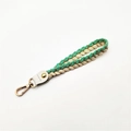Handmade woven cotton wrist strap with green cream ropes and golden lobster clasp charm - Light Green