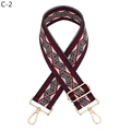 Macro detail of red black and white geometric woven strap with gold metal lobster clasps - Wine Red Diamond (C-2)