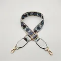 Close-up of bohemian geometric patterns and golden metal hardware on a white SPU strap - White Orchid with White Leather (Style 6) / Silver Clasp