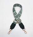 Detail of green and white geometric woven strap with leather ends and gold metal clips - Green with Green Leather (Style 14) / Silver Clasp