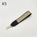 Detail of woven strap with gold glitter stripe and premium metal lobster clasp - Khaki Gold Line
