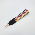 Ethnic style woven wrist strap with colorful geometric patterns and golden metal hooks - No.12 Multicolor Pixel Weave + Black Leather