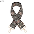 Detail view of the floral patterned woven bag strap with gold metal buckles and hooks - Black Flesh Pink Floral (C-52) / Silver Clasp