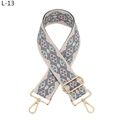 Detail of adjustable wide shoulder strap with blue and purple jacquard geometric pattern - L-13 Light Blue