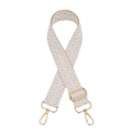 Dettaglio della tracolla intrecciata bohémien con motivi geometrici e ganci dorati - Chiusura in Argento / Beige