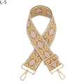 Detail von geometrischem Jacquard-Taschenriemen mit goldenen Karabinern und Schnalle - L-5 Gelb