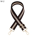 Detail of adjustable wine red and gold striped bag strap with gold metal swivel hooks - Jujube Red (M-2)