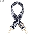 Close-up of geometric jacquard bag strap with gold metal swivel snap hooks and buckle - Blue (L-13) Silver Clasp