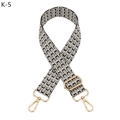 Close-up of geometric jacquard shoulder strap with gold-tone swivel snap hooks - Gray