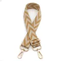 Close-up of adjustable woven shoulder strap with mustard yellow herringbone pattern and gold hooks - No.11 Beige & Light Brown