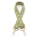Detail of adjustable green and beige woven canvas guitar strap with gold metal buckles - No.16 Beige & Light Green