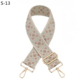 Detail view of wide woven bag strap with geometric jacquard pattern and gold buckle - Khaki Matcha Green Pink Floral (S-13) / Silver Clasp