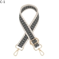 Detail view of woven black and white chevron bag strap with gold metal lobster hooks - Khaki Border Black Grey