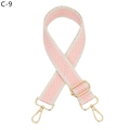Detailed view of pink and beige woven chevron guitar strap with gold metal buckles - Pink