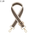 Detail of adjustable woven chevron bag strap with light gold metal lobster clasps - Khaki Border Black