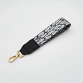 Zebra print fabric wrist strap with leather connection and golden metal swivel hook - Gray Leopard Front