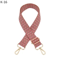 Close-up of adjustable pink and grey jacquard bag strap with gold metal hardware - K-16