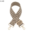 Détail de la bandoulière tissée réglable avec motifs croissants noirs et fermoirs dorés - K-40 Noir Kaki Boucle Dorée