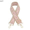 Detail of pink and beige woven bag strap with geometric star patterns and gold metal hooks - Pink Geometric (A-7)