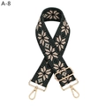 Detail of adjustable geometric jacquard bag strap with gold metal swivels and floral weave - Dark Green Geometric (A-8)