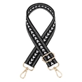 Detail of adjustable black woven strap with white arrow pattern and gold metal hardware - Black