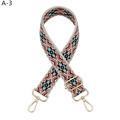 Detail of adjustable woven canvas strap with ethnic geometric patterns and gold hardware - A-3 Rice White Floral