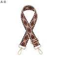 Detail of bohemian geometric woven shoulder strap in orange and black with gold hardware - Silver Clasp / A-8 Black Edge Orange Floral