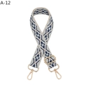 Close-up of geometric jacquard pattern webbing and gold metal buckle on a folk bag strap - Silver Clasp / A-12 Light Blue Floral
