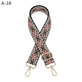 Close-up of ethnic geometric pattern woven bag strap with light gold metal lobster clasps - A-18 Black Silver Thread Floral