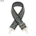 Detailaufnahme des民族风-Webbands mit goldenen Metall-Karabinerverschlüssen für Taschen - Schwarze Basis Weiß Grün Geometrisches Ethno-Muster (X-9)