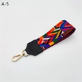 Close-up of ethnic woven handbag strap accessory with colorful geometric patterns - Rainbow With Black Faux Leather (A-5)