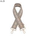 Detail view of ethnic style wide strap with beige geometric weave and gold metal hooks - Gray Jacquard (A-25)