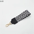 Detail of black and white geometric woven strap with golden metal spring hook closure - White Rhombus With Black Faux Leather (A-8)