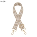 Detail of adjustable geometric jacquard bag strap with gold metal hooks and buckle - Khaki (M-30)