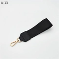 Detail of black woven hand strap with premium gold lobster clasp and stitched leather end - Solid Nylon With Black Faux Leather (A-13)