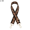 Detail view of woven shoulder strap with geometric chain pattern and gold metal hooks - Black Brown Style (L-16) / Gold Buckle